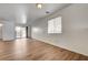 Bright and spacious living room with new wood flooring and natural light at 8396 Pearl Beach Ct, Las Vegas, NV 89139