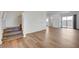 Open floor plan with new flooring, leading to outdoor access at 8396 Pearl Beach Ct, Las Vegas, NV 89139