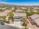 Aerial view of a beautiful property showcasing its well-manicured yard at 8516 Canyon Ranch St, Las Vegas, NV 89131