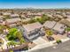 Wide aerial view of a Gathering home and surrounding homes in the neighborhood at 8516 Canyon Ranch St, Las Vegas, NV 89131