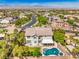 Aerial view of home featuring a backyard pool and lush landscaping at 8516 Canyon Ranch St, Las Vegas, NV 89131