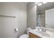 Bright bathroom featuring a single sink vanity with tile flooring and modern fixtures at 8516 Canyon Ranch St, Las Vegas, NV 89131