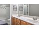 Bathroom featuring a double sink vanity with a tiled shower/tub combination at 8516 Canyon Ranch St, Las Vegas, NV 89131