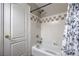 Bathroom featuring a shower and tub combination with a decorative shower curtain at 8516 Canyon Ranch St, Las Vegas, NV 89131