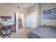 Bedroom with neutral walls, carpet flooring and desk area at 8516 Canyon Ranch St, Las Vegas, NV 89131