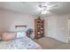 Bedroom featuring a bed, shelves, and neutral colored walls at 8516 Canyon Ranch St, Las Vegas, NV 89131