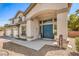 Home's front door is a double door with nice landscaping and a covered entry way at 8516 Canyon Ranch St, Las Vegas, NV 89131