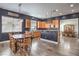 Eat-in kitchen with wood floors, stainless steel appliances, and wood cabinets at 8516 Canyon Ranch St, Las Vegas, NV 89131