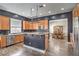 Eat-in kitchen with wood floors, stainless steel appliances, and center island at 8516 Canyon Ranch St, Las Vegas, NV 89131