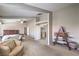 Spacious main bedroom featuring high ceilings, natural light, and seating area at 8516 Canyon Ranch St, Las Vegas, NV 89131