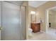 Bathroom featuring a glass shower, vanity and ceramic tile flooring at 8608 Willow Cabin St, Las Vegas, NV 89131