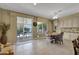 Cozy breakfast nook with sliding glass doors to the patio and bright natural light at 8608 Willow Cabin St, Las Vegas, NV 89131