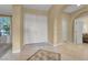 Welcoming foyer boasts tile flooring and high ceilings, seamlessly connecting to living spaces at 8608 Willow Cabin St, Las Vegas, NV 89131