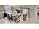 Well-equipped kitchen with a large island and stainless steel appliances at 8608 Willow Cabin St, Las Vegas, NV 89131