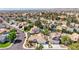Spacious residential area with neatly arranged homes, streets, and greenery at 8761 Anchor Point Ave, Las Vegas, NV 89117