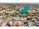 Desirable neighborhood featuring homes near a lake, surrounded by lush greenery at 8761 Anchor Point Ave, Las Vegas, NV 89117