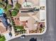 Bird's-eye view showcases a well-manicured home with a landscaped yard, complemented by a pristine roof at 8761 Anchor Point Ave, Las Vegas, NV 89117