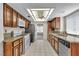 Well-lit kitchen featuring granite countertops and modern appliances at 8761 Anchor Point Ave, Las Vegas, NV 89117