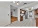 Spacious kitchen with tile flooring and view into living room at 8761 Anchor Point Ave, Las Vegas, NV 89117