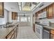 Beautiful kitchen featuring a gas range and granite countertops at 8761 Anchor Point Ave, Las Vegas, NV 89117