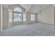 Bright living room with large windows and vaulted ceilings at 8761 Anchor Point Ave, Las Vegas, NV 89117