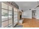 Open living room features hardwood floors, fireplace, and sliding glass doors to the backyard patio at 8761 Anchor Point Ave, Las Vegas, NV 89117