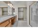 The bathroom features a spacious vanity, shower, and closet, creating a functional design at 8761 Anchor Point Ave, Las Vegas, NV 89117