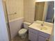 Modest bathroom features a toilet, sink, and shower with light purple accents at 8813 Pavia Dr, Las Vegas, NV 89117