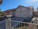 Single Gathering home with desert landscaping, and a two-car garage with driveway at 8813 Pavia Dr, Las Vegas, NV 89117