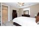 Comfortable bedroom features a dresser, bedside table, and access to the hallway at 8873 Howell St, Las Vegas, NV 89166