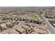 Aerial shot of an orderly neighborhood featuring uniform houses and a centrally located community park at 8873 Howell St, Las Vegas, NV 89166