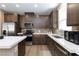 Modern kitchen showcasing granite counters, stainless steel appliances, and ample cabinet space at 8873 Howell St, Las Vegas, NV 89166