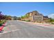 Street view featuring Eaglepointe community sign, landscaping, and various home elevations at 8873 Howell St, Las Vegas, NV 89166