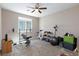 This room offers a carpeted floor, fitness equipment, and plenty of space, making it ideal for exercise at 8873 Howell St, Las Vegas, NV 89166