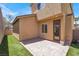 Backyard featuring patio, artificial grass, and a privacy fence at 992 Wagner Valley St, Henderson, NV 89052