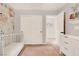 Bright Bedroom with crib, white dresser, closet and view to the hallway at 992 Wagner Valley St, Henderson, NV 89052