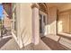 Private courtyard with brick flooring and decorative architectural details at 1 Corte Belleza, Henderson, NV 89011