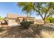 Backyard featuring desert landscaping, large trees, and privacy at 10009 Netherton Dr, Las Vegas, NV 89134