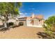 Charming single-story home featuring a tile roof, well-maintained landscaping, and a cozy, inviting facade at 10009 Netherton Dr, Las Vegas, NV 89134
