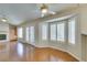 Spacious living area with fireplace, wood floors, and lots of natural light at 10009 Netherton Dr, Las Vegas, NV 89134
