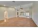 Spacious living room with hardwood floors and carpet, showcasing high ceilings and an open floorplan at 10009 Netherton Dr, Las Vegas, NV 89134