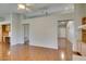 Open-concept living room boasts beautiful flooring and recessed lighting at 10009 Netherton Dr, Las Vegas, NV 89134