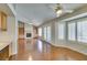 Bright living room area with a view of the fireplace and eat-in kitchen area at 10009 Netherton Dr, Las Vegas, NV 89134