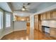Bright living space with shutters and a view of the eat-in kitchen at 10009 Netherton Dr, Las Vegas, NV 89134