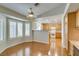Bright living space with plantation shutters and hardwood floors leading to the kitchen at 10009 Netherton Dr, Las Vegas, NV 89134