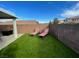 Backyard features artificial turf and lounge chairs, perfect for relaxation at 1018 Snow Bunting Ct, Henderson, NV 89002