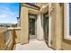 Balcony with views and an entrance to the building at 10230 Danskin Dr, Las Vegas, NV 89166