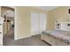 Bedroom with sliding door closets and next to hallway entrance at 10230 Danskin Dr, Las Vegas, NV 89166