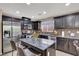 Well-equipped kitchen featuring granite countertops, stainless steel appliances, and ample cabinet space at 10230 Danskin Dr, Las Vegas, NV 89166