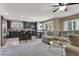 Open-concept living space combining the kitchen, dining area, and living room at 10230 Danskin Dr, Las Vegas, NV 89166